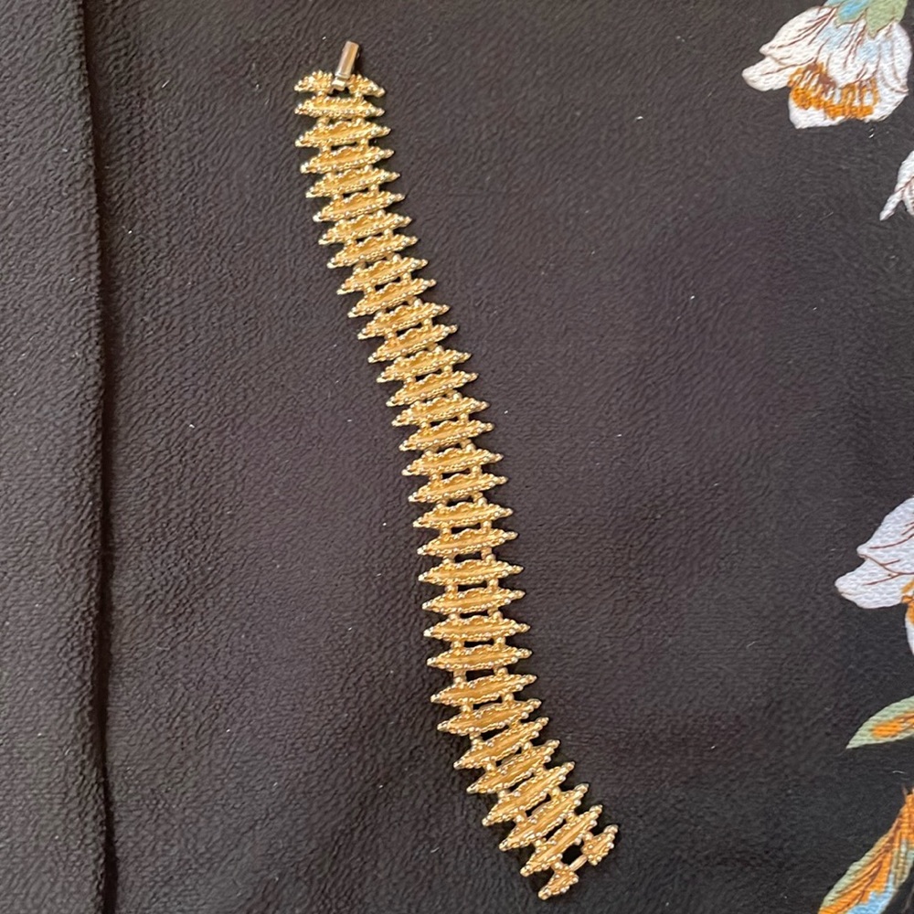 Vintage gold bracelet by Avon. 7"long. Great condition  great for stacking !!